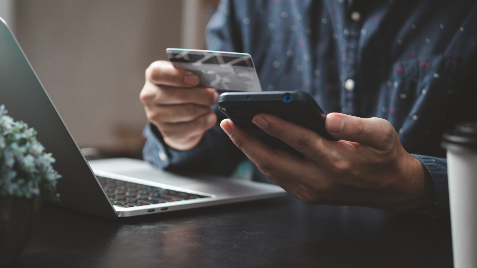 Image of how easy it is to bank remotely, by phone of laptop